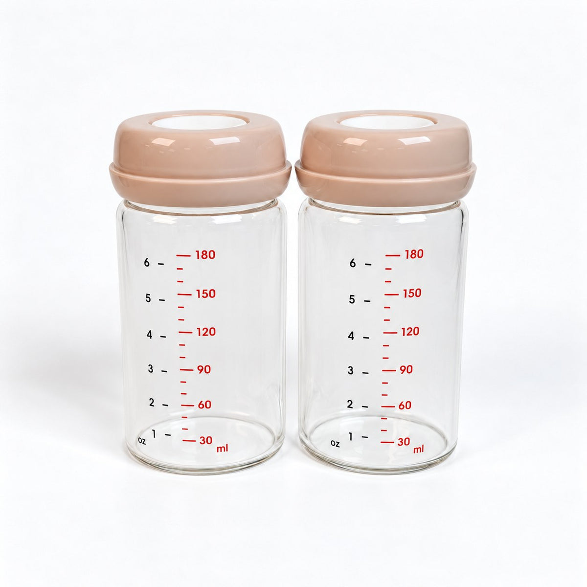 Twee glazen moedermelk bewaarflesjes 180 ml met perzik dop